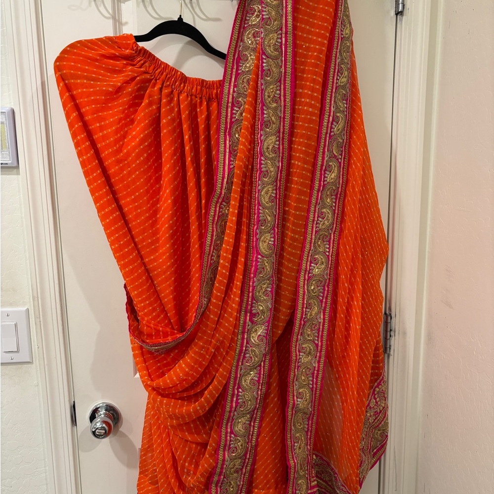 Monika Saree Fall - Vibrant Orange Sari with Intricate Pink and Gold Border